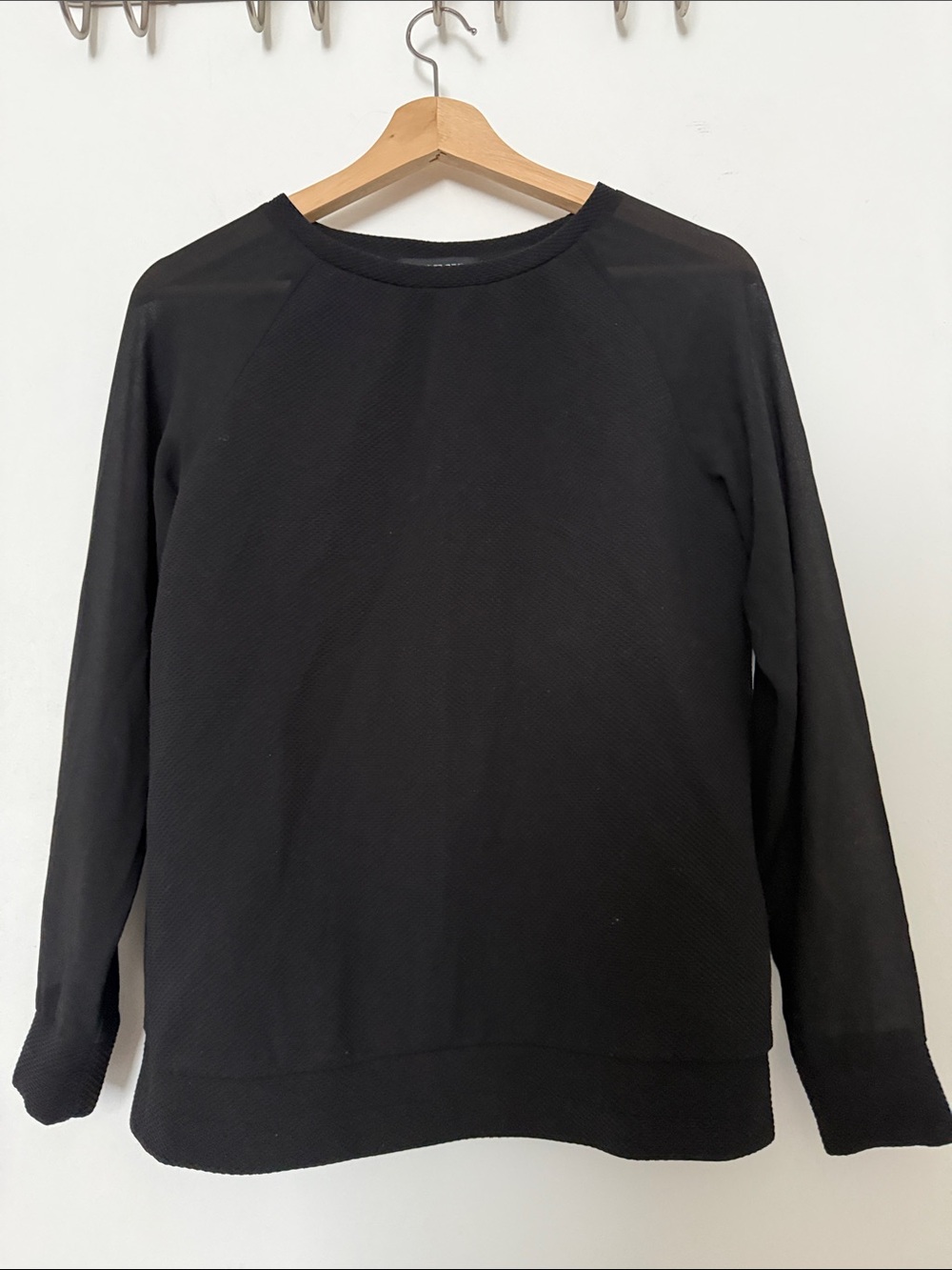 Black crewneck textured top with sheer sleeves - size S/P